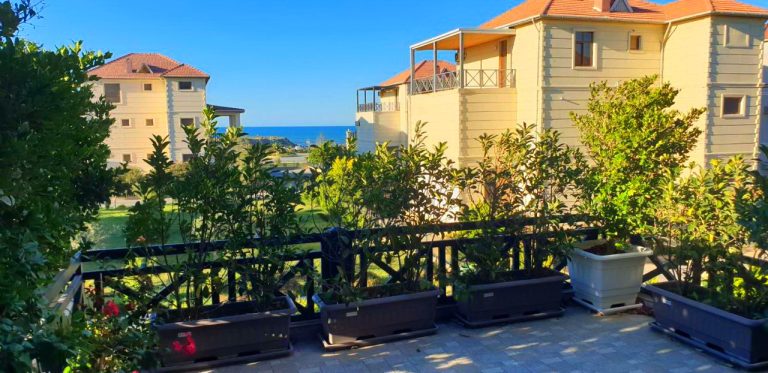 S Pollo Apartments by first beach line